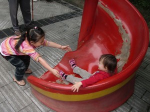 T. making friends at the playground