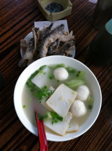fishballs and fish cake in soup with dried fried fish skin