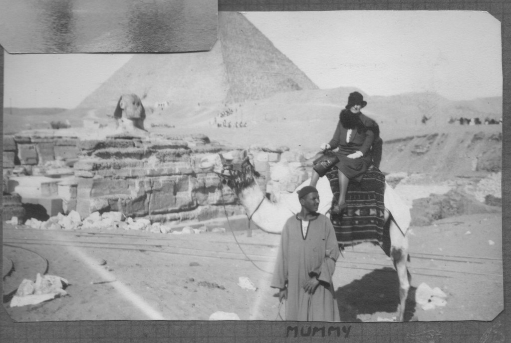 My great-grandmother on a camel, with pyramid & sphinx in the background