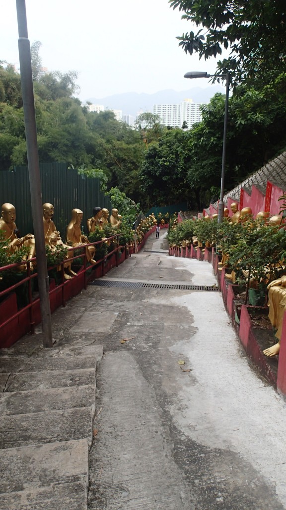 Statues lining the path to the temple