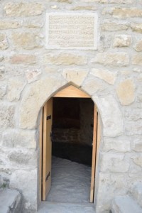 A doorway to one of the cells. The inscription above is in sanskrit.