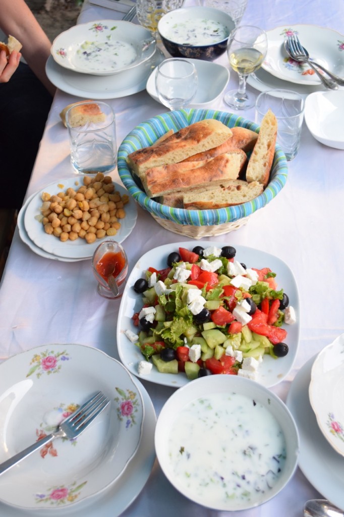 Bread, salad, chickpeas and fresh yogurt soup